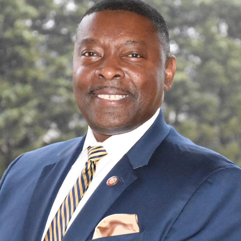The Honorable Raymond Smith Jr.